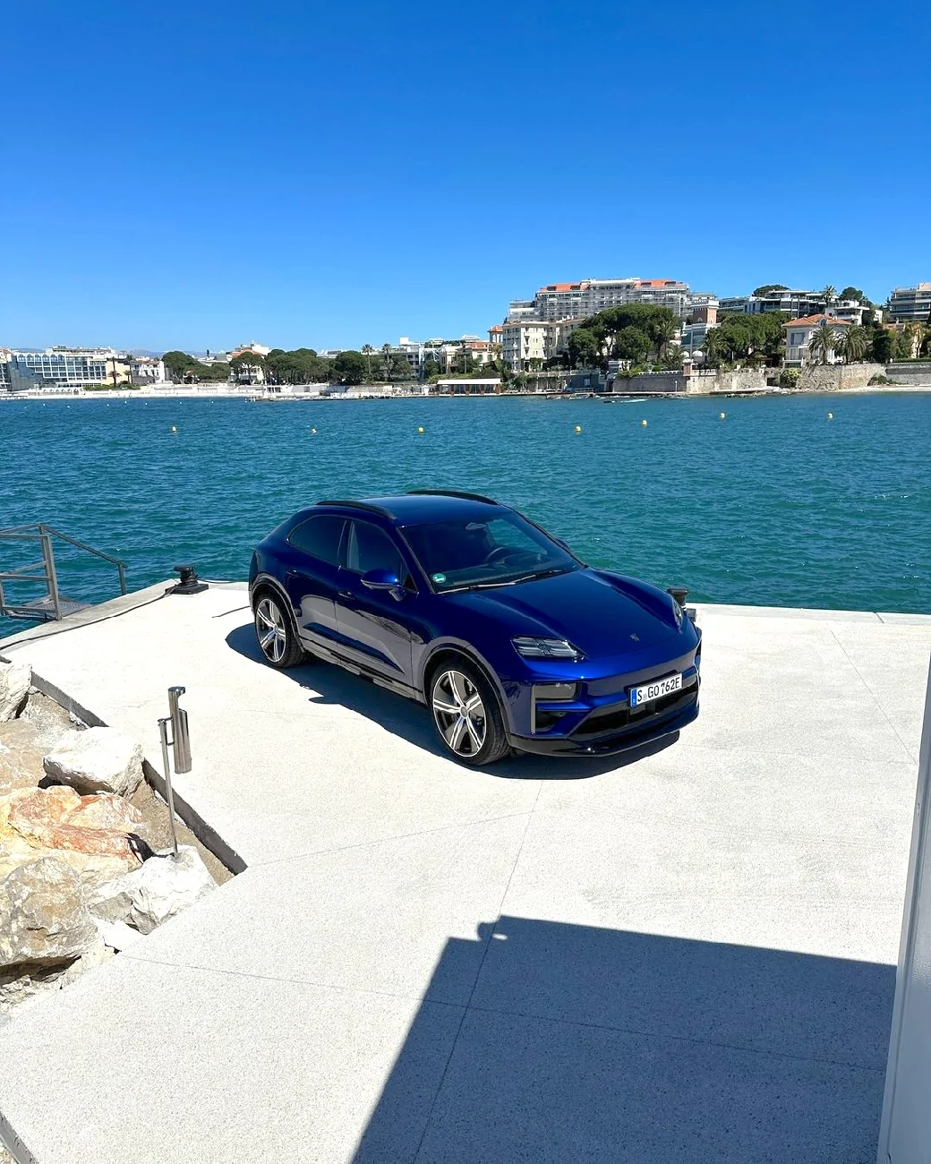 Electric Macan EV GENTIAN BLUE Macan EV Photos gentian blue macan ev electric color photo