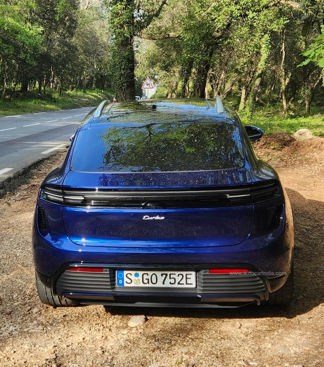 Electric Macan EV GENTIAN BLUE Macan EV Photos Gentian Blue Electric Macan EV rear