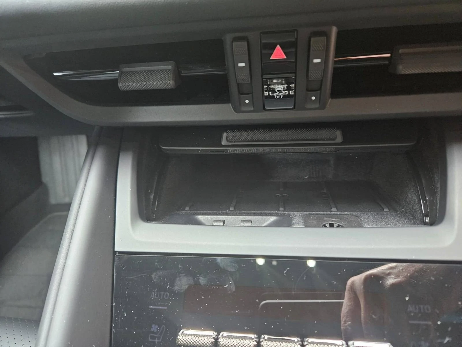 Electric Macan EV charging telephone compartment : the new black hole WhatsApp Image 2025-02-08 at 14.07.37