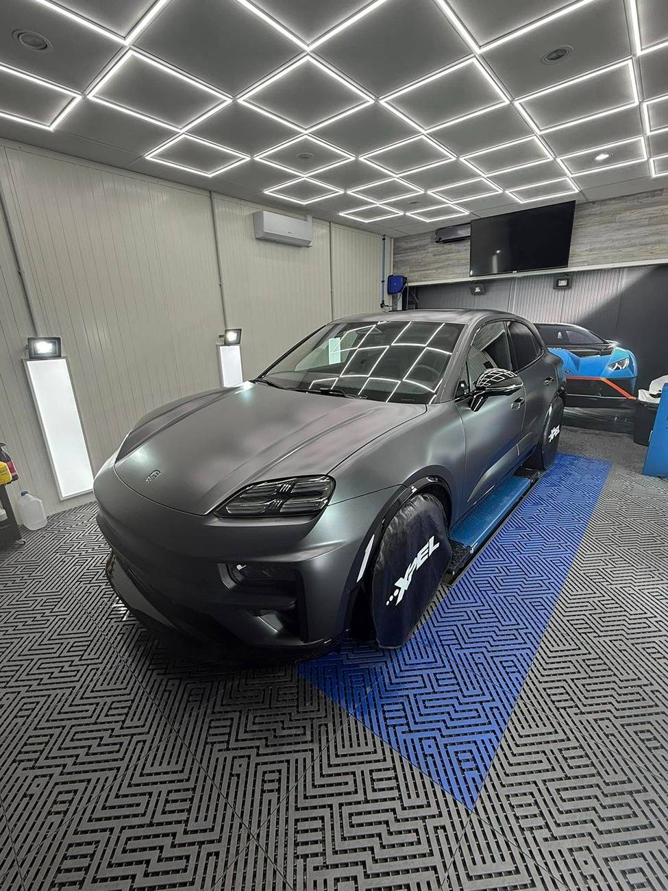 Electric Macan EV Black Macan Turbo EV with Matte Stealth PPF + grey Porsche crest emblem Black Macan Turbo EV with Matte Stealth PPF + grey Porsche crest emblem 2