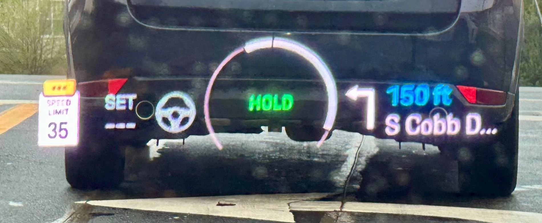 Electric Macan EV HUD - what is the white outline on the center circle ? IMG_7736