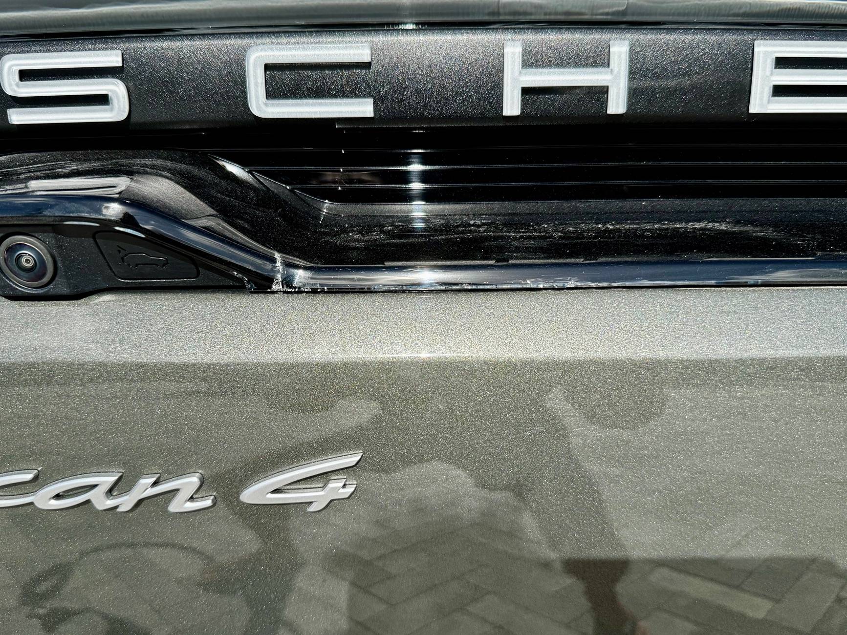 Electric Macan EV Cracks on black glass trunk trim IMG_5722