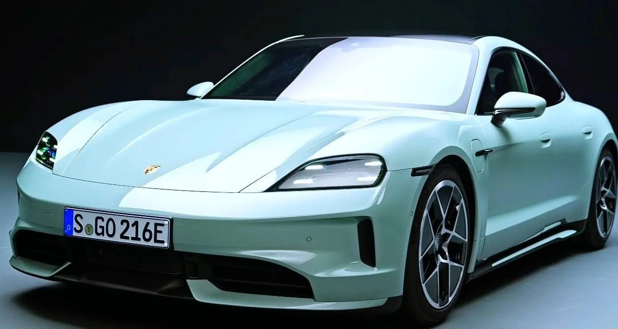 Electric Macan EV Who has 2 Macan EV's sitting in the driveway? shade green taycan