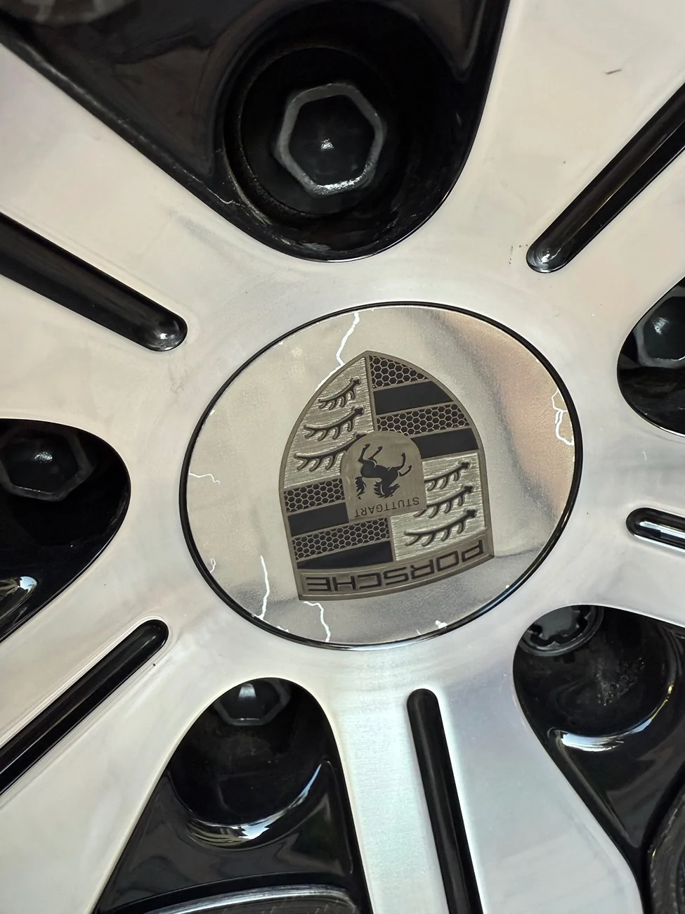 Electric Macan EV Center cap scratches IMG_6441