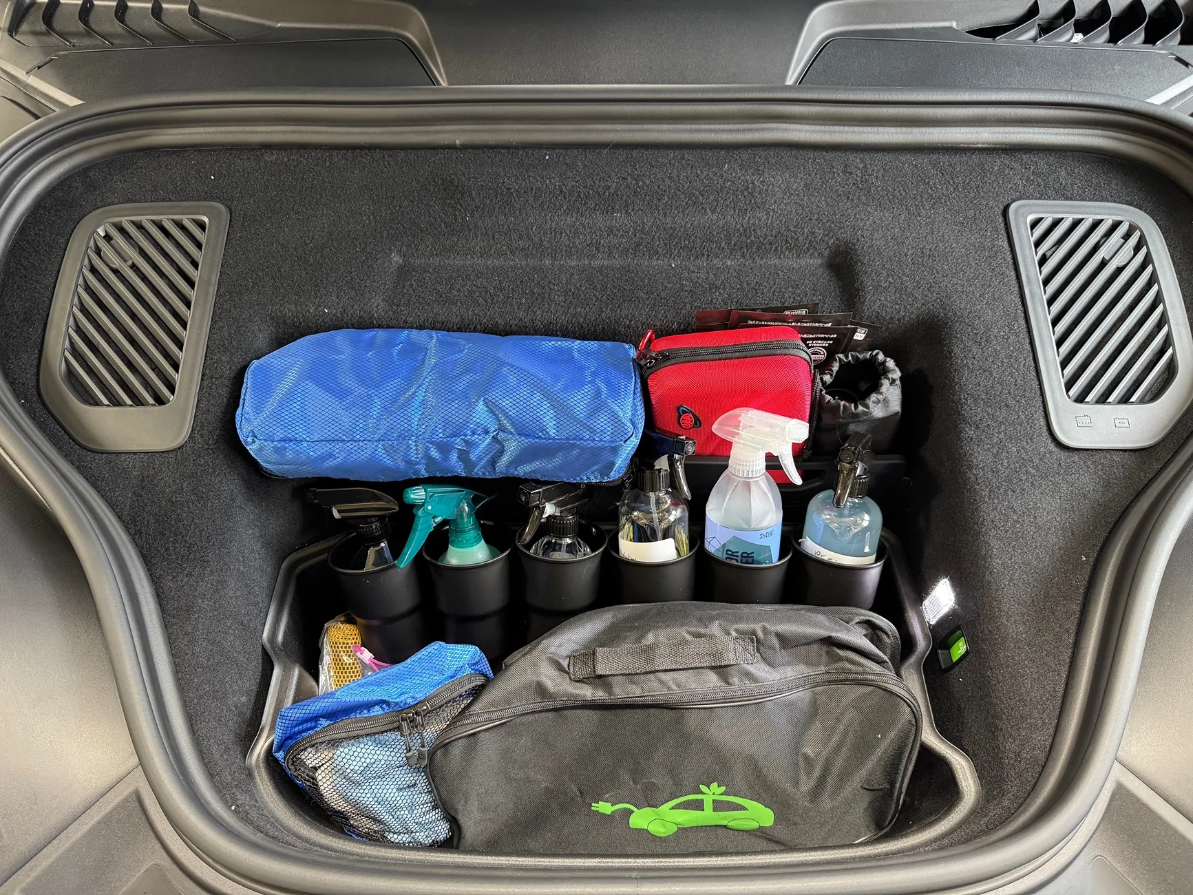 Electric Macan EV Frunk additions for cleaning supplies on the road IMG_7266