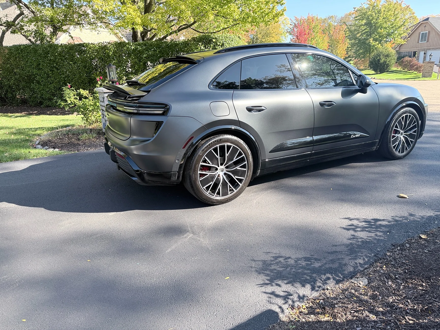 Electric Macan EV Gloss black upper and lower spoiler installed IMG_1403
