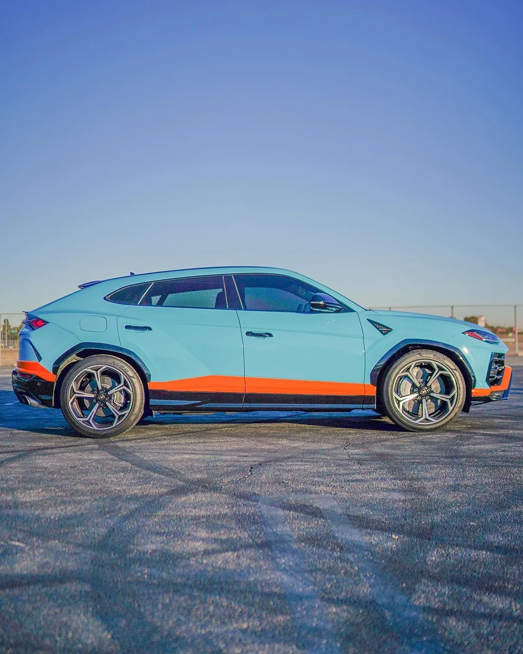 Electric Macan EV Orange accents on Frozen Blue Macan EV 129740209_1640389456133137_7245407081754748016_n