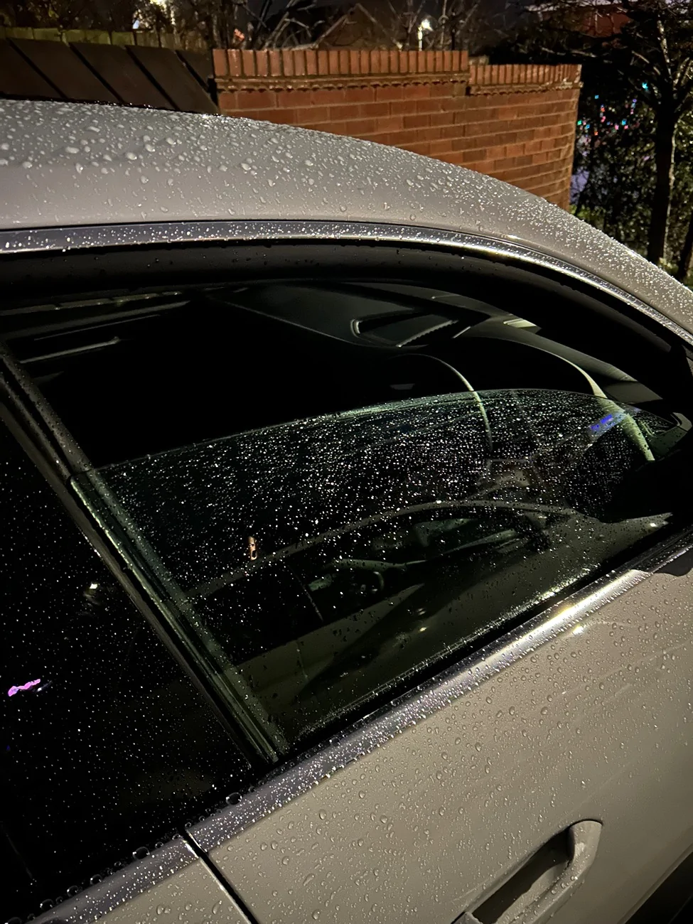 Electric Macan EV Nearside (left) front window opening itself IMG_3116