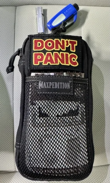 Electric Macan EV Center Armrest storage management IMG_7870 (1)