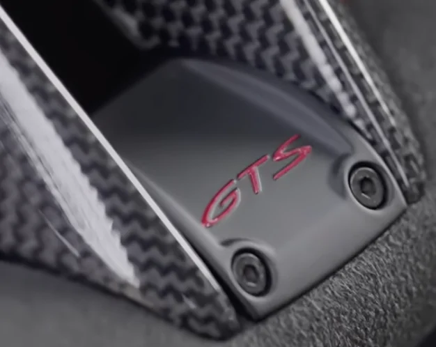 Electric Macan EV GTS logo on steering wheel, part number Screenshot 2026-03-24 at 17.37.47